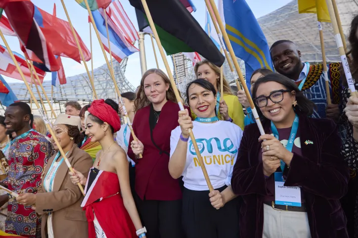flag bearers and branded tshirt one young world summit munich